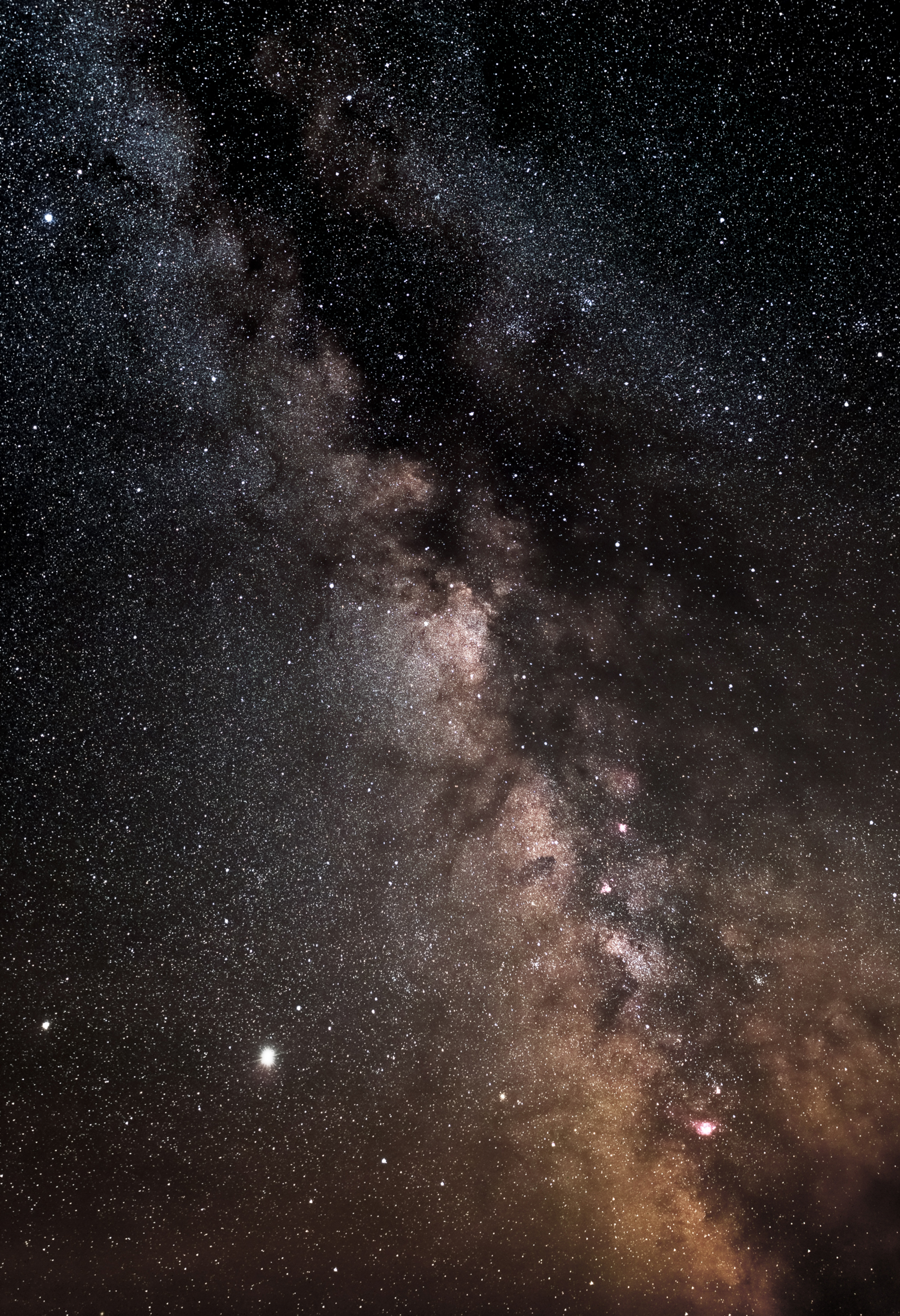 Saturn and Jupiter with our home galaxy.